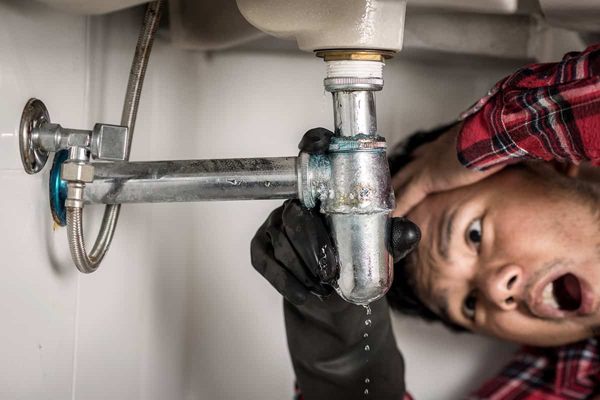 Under sink plumbing issue discovered by homeowner